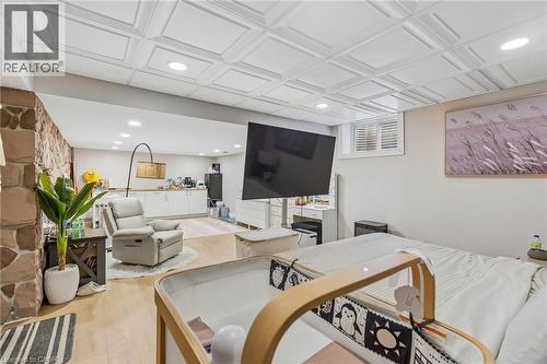 Living room with light wood-type flooring and recessed lighting - 3 Chicopee Terrace, Kitchener, ON - Indoor