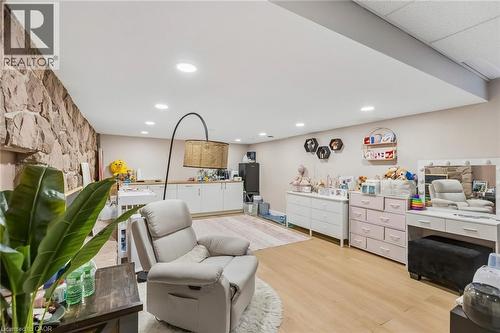 Sitting room featuring light wood finished floors - 3 Chicopee Terrace, Kitchener, ON - Indoor