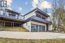 View of front facade featuring stucco siding, an attached garage, a balcony, and concrete driveway - 3 Chicopee Terrace, Kitchener, ON  - Outdoor With Deck Patio Veranda 