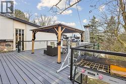 Wooden terrace with a gazebo - 