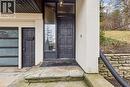 Doorway to property featuring stucco siding and a porch - 3 Chicopee Terrace, Kitchener, ON  - Outdoor 