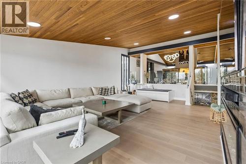 Living area featuring light wood-type flooring, a vaulted wood ceiling, and recessed lighting - 3 Chicopee Terrace, Kitchener, ON -  Photo Showing Living Room