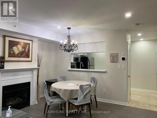 274 - 3 Everson Drive, Toronto, ON - Indoor Photo Showing Dining Room With Fireplace
