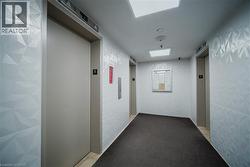 Hall featuring elevator - 