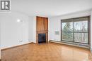 304 385 Kingsmere Boulevard, Saskatoon, SK  - Indoor Photo Showing Living Room With Fireplace 
