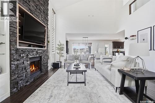 4128 Green Willow Terrace E, Regina, SK - Indoor Photo Showing Living Room With Fireplace
