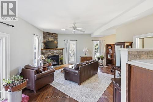 22476 Coldstream Road, Middlesex Centre, ON - Indoor Photo Showing Living Room With Fireplace
