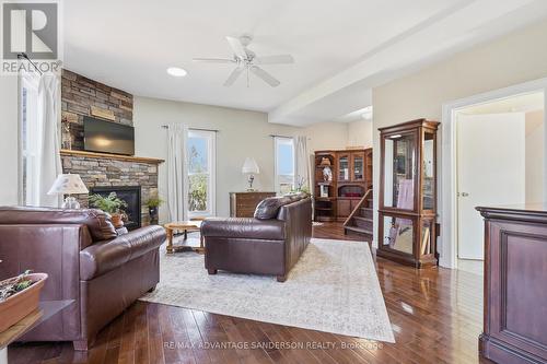 22476 Coldstream Road, Middlesex Centre, ON - Indoor Photo Showing Living Room With Fireplace