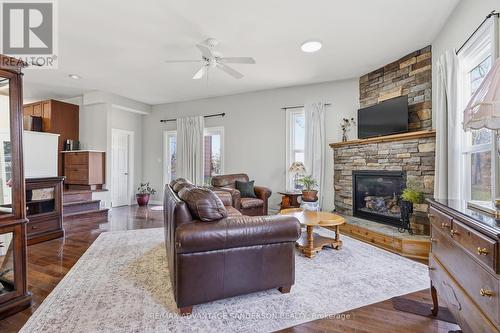 22476 Coldstream Road, Middlesex Centre, ON - Indoor Photo Showing Living Room With Fireplace