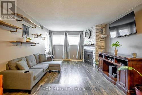 120 - 78 Roehampton Avenue, St. Catharines (Carlton/Bunting), ON - Indoor Photo Showing Living Room With Fireplace