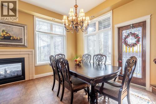 2514 Broderick Road, Regina, SK - Indoor Photo Showing Dining Room With Fireplace