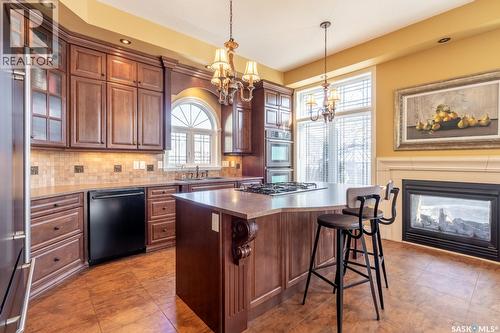 2514 Broderick Road, Regina, SK - Indoor Photo Showing Kitchen With Fireplace