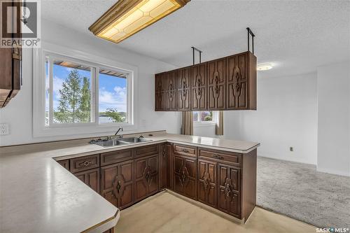 115 Boyer Drive, Murray Lake, SK - Indoor Photo Showing Kitchen With Double Sink