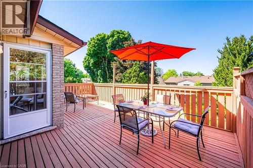 Wooden deck featuring outdoor dining area - 488 Heather Hill Place, Waterloo, ON - Outdoor With Deck Patio Veranda With Exterior