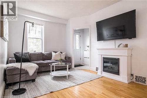 24 Patrick Street, Hamilton, ON - Indoor Photo Showing Living Room With Fireplace