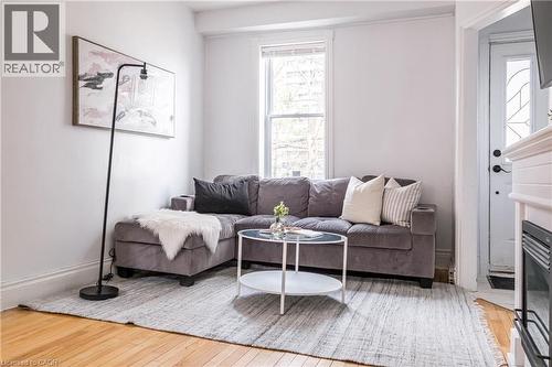 24 Patrick Street, Hamilton, ON - Indoor Photo Showing Living Room With Fireplace