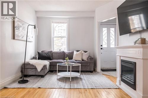 24 Patrick Street, Hamilton, ON - Indoor Photo Showing Living Room With Fireplace