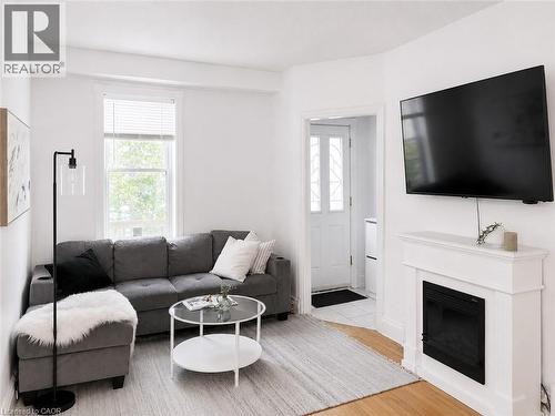 24 Patrick Street, Hamilton, ON - Indoor Photo Showing Living Room With Fireplace