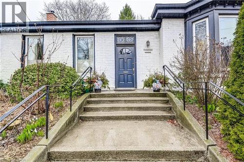 Doorway to property with brick siding and a chimney - 315 Aberdeen Avenue, Hamilton, ON - Outdoor