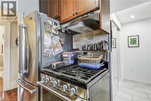 Kitchen with gas stove, wood finish cabinetry, decorative backsplash, and recessed lighting - 315 Aberdeen Avenue, Hamilton, ON - Indoor Photo Showing Kitchen