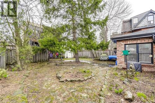 Fenced backyard featuring a storage unit - 315 Aberdeen Avenue, Hamilton, ON - Outdoor