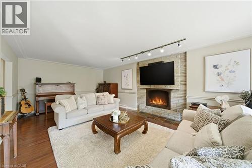 6 Summit Circle, Simcoe, ON - Indoor Photo Showing Living Room With Fireplace