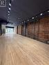 Retail Space with track lighting and brick wall - 228 James Street N, Hamilton, ON 