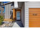 This entry way welcomes you home - 1860 Blue Bunch Court, Kelowna, BC  - Outdoor With Exterior 