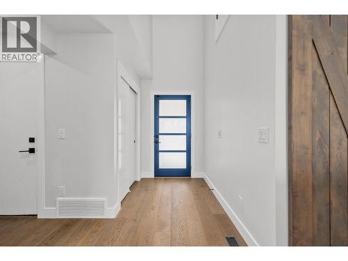 Great blue hints throughout - 1860 Blue Bunch Court, Kelowna, BC - Indoor Photo Showing Other Room