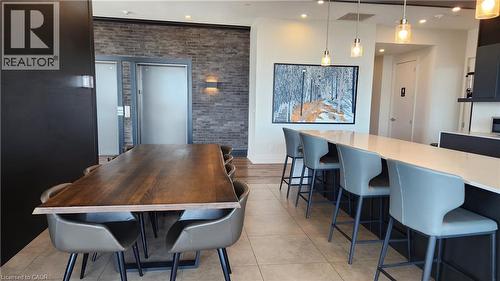 Indoor rooftop lounge & bar - 101 Locke Street Unit# 511, Hamilton, ON - Indoor Photo Showing Dining Room