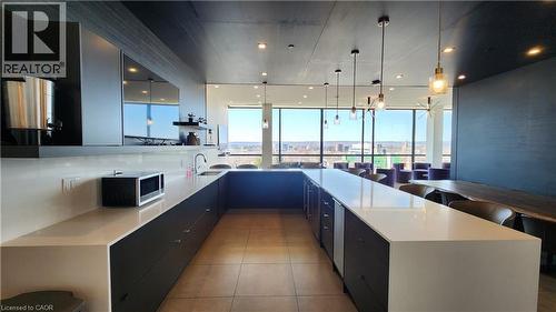 Indoor rooftop lounge & bar - 101 Locke Street Unit# 511, Hamilton, ON - Indoor Photo Showing Kitchen With Upgraded Kitchen