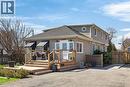 View of front of home featuring a wooden deck and roof with shingles - 844 Upper Wellington Street, Hamilton, ON  - Outdoor 