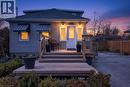View of front of home with a shingled roof and a wooden deck - 844 Upper Wellington Street, Hamilton, ON  - Outdoor 