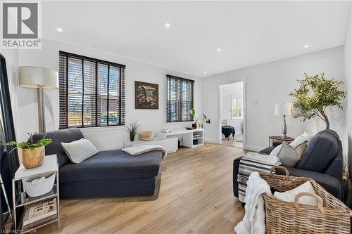 Living room featuring recessed lighting and light wood-style flooring - 844 Upper Wellington Street, Hamilton, ON - Indoor Photo Showing Living Room