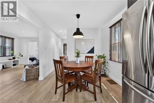 Dining room with light wood-style flooring - 844 Upper Wellington Street, Hamilton, ON - Indoor Photo Showing Dining Room