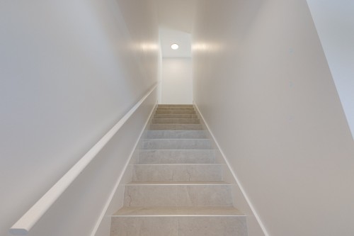 Staircase - 11385 Av. L'Archevêque, Montréal (Montréal-Nord), QC - Indoor Photo Showing Other Room