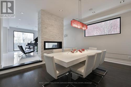 647 Montbeck Crescent, Mississauga, ON - Indoor Photo Showing Dining Room With Fireplace