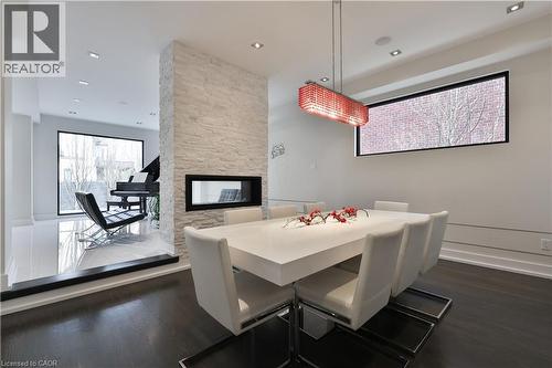 647 Montbeck Crescent, Mississauga, ON - Indoor Photo Showing Dining Room With Fireplace