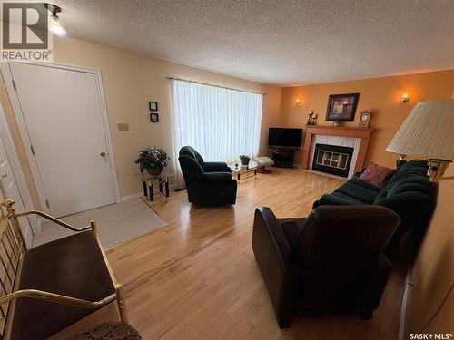 109 Road Avenue, Langenburg, SK - Indoor Photo Showing Living Room With Fireplace