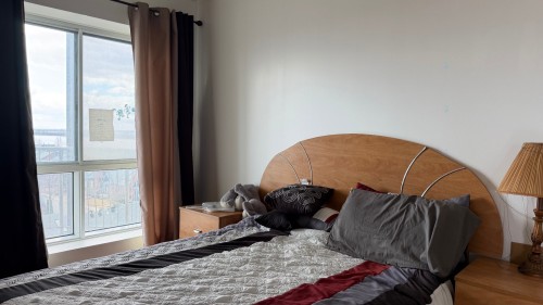 Chambre à coucher - 805-7680 Boul. Marie-Victorin, Brossard, QC - Indoor Photo Showing Bedroom