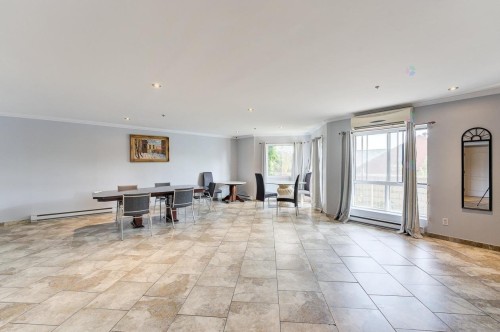 Salle communautaire - 805-7680 Boul. Marie-Victorin, Brossard, QC - Indoor Photo Showing Other Room
