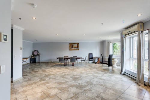 Salle communautaire - 805-7680 Boul. Marie-Victorin, Brossard, QC - Indoor Photo Showing Other Room