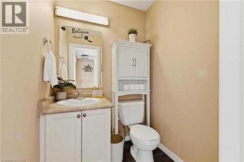 Bathroom featuring vanity and dark tile patterned floors - 750 Lawrence Street Unit# 88, Cambridge, ON - Indoor Photo Showing Bathroom