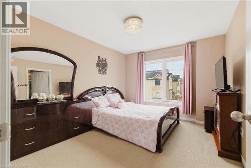 Bedroom featuring light carpet and baseboards - 750 Lawrence Street Unit# 88, Cambridge, ON - Indoor Photo Showing Bedroom