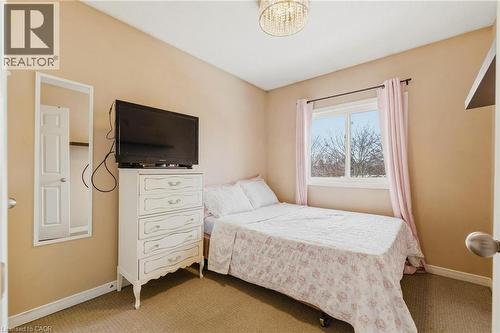 Bedroom with light colored carpet and baseboards - 750 Lawrence Street Unit# 88, Cambridge, ON - Indoor Photo Showing Bedroom