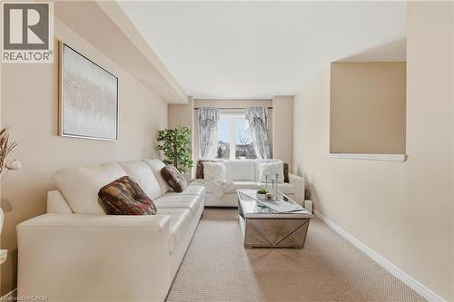 Carpeted living room with baseboards - 750 Lawrence Street Unit# 88, Cambridge, ON - Indoor Photo Showing Other Room