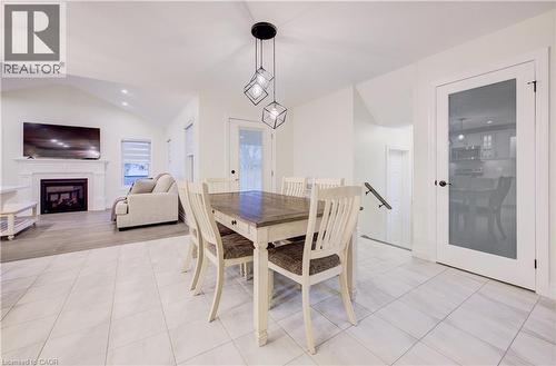 4 Livingston Drive, Tillsonburg, ON - Indoor Photo Showing Dining Room With Fireplace