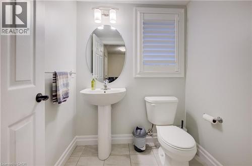 patterned flooring - 4 Livingston Drive, Tillsonburg, ON - Indoor Photo Showing Bathroom
