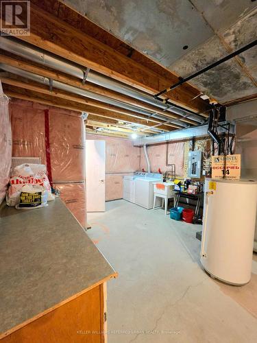 Laundry room with folding table - 129 Dolce Crescent, Vaughan, ON - Indoor Photo Showing Basement