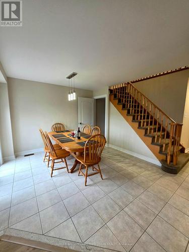 Eat in kitchen with walk out to yard - 129 Dolce Crescent, Vaughan, ON - Indoor Photo Showing Other Room